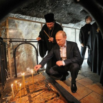 President Putin venerates the Stone of the Anointing