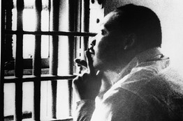 Martin Luther King Jr. sits in a jail cell at the Jefferson County Courthouse in Birmingham, Alabama in October 1967